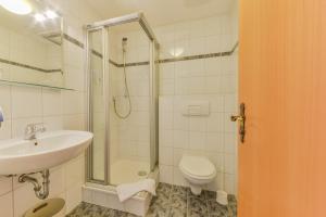 Koupelna v ubytování Hotel Zur Mühle + 15 fotografií