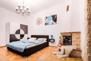 Postel nebo postele na pokoji v ubytování Art Apartments Ruzova