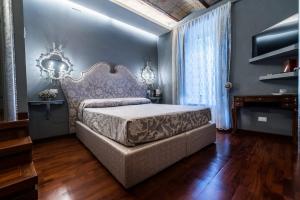 Posteľ alebo postele v izbe v ubytovaní Hotel Antica Locanda + 37 fotografií