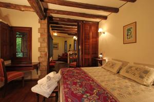 Cama ou camas em um quarto em Casa Glebinias