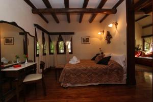 Cama ou camas em um quarto em Casa Glebinias