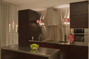 A cozinha ou cozinha compacta de Yoo Punta del Este - Rental Club Apartments