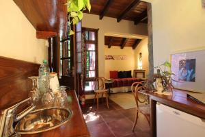 A cozinha ou cozinha compacta de Casa Glebinias