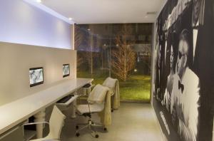 Uma TV ou centro de entretenimento em Yoo Punta del Este - Rental Club Apartments