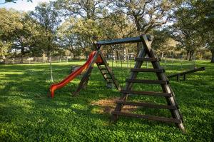 a playground with a slide and a ladder at Villa Paolija in Novigrad Istria