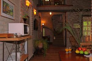 Uma TV ou centro de entretenimento em Casa Glebinias