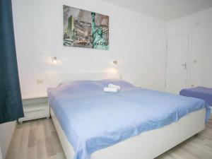 Posteľ alebo postele v izbe v ubytovaní Sesar Apartments Krk - No. 3 Cvita