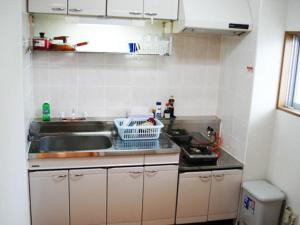 Køkken eller tekøkken på BIGJOY INN Hirokouji