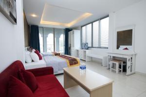 TV a/nebo společenská místnost v ubytování SCAT Hotel- New World Bến Thành