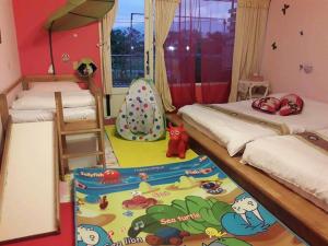 Postel nebo postele na pokoji v ubytování 101 Homestay