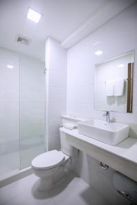 Ett badrum på S Hotel & Residences