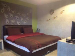 Letto o letti in una camera di The Curve Residence