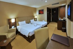 TV a/nebo společenská místnost v ubytování Lintas View Hotel