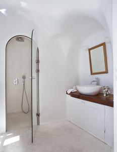 A bathroom at Perivolas Hotel