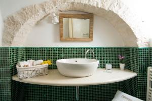 Koupelna v ubytování Masseria Serralta + 29 fotografií