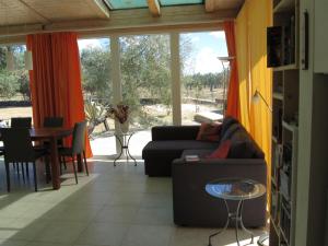 Ein Sitzbereich in der Unterkunft casa olivi