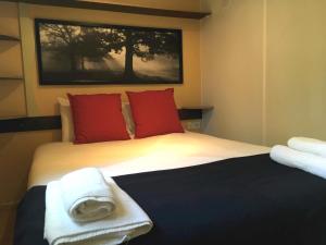 Katil atau katil-katil dalam bilik di Camping La Fundicion