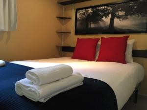 Cama o camas de una habitación en Camping La Fundicion
