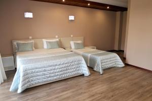 Katil atau katil-katil dalam bilik di Hotel Contriz