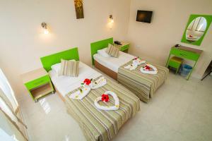 A bed or beds in a room at Hotel Dream Of Side