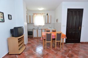 Kuchyň nebo kuchyňský kout v ubytování Apartments Slavica 590
