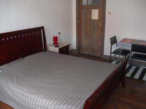 Postel nebo postele na pokoji v ubytování Guesthouse Oude Houtmarkt