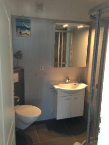 Et badeværelse på Haus-Sonnenschein-Wohnung-5