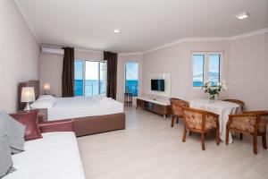 Postel nebo postele na pokoji v ubytování Open Sea Apartments