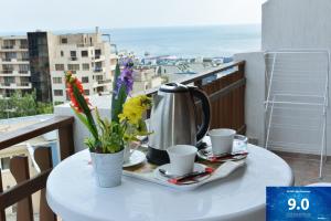 A balcony or terrace at OLYMP Apart-Complex