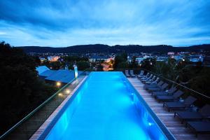 Bazén v ubytování Hotel Villa Hügel nebo v jeho okolí