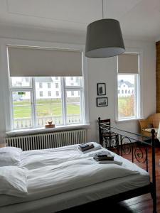 En eller flere senger på et rom på Downtown Guesthouse Reykjavik