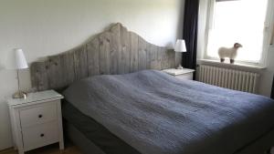 Postel nebo postele na pokoji v ubytování Ferienbauernhof De Slaaphoeve