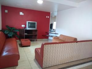 TV a/nebo společenská místnost v ubytování Hotel Pato Branco