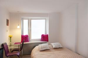 Postel nebo postele na pokoji v ubytování Apartament SYNERGIA