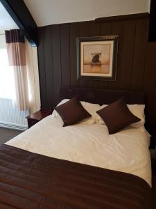 Letto o letti in una camera di Old George Hotel