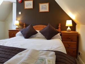 Letto o letti in una camera di Old George Hotel