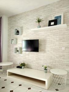 Televízia a/alebo spoločenská miestnosť v ubytovaní Apartamento Capuchinos