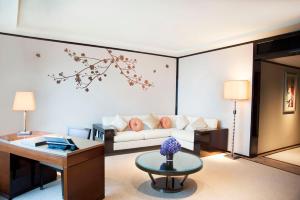 Area soggiorno di The Peninsula Hong Kong