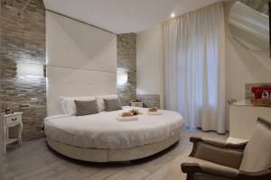 Postel nebo postele na pokoji v ubytování Vatican Tourist Inn