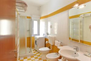 Um banheiro em Hotel Villa Olga