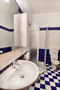 Um banheiro em Hotel Villa Olga