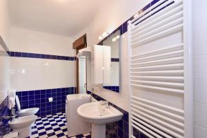 Um banheiro em Hotel Villa Olga
