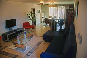 
A seating area at Apartamento Neptuno
