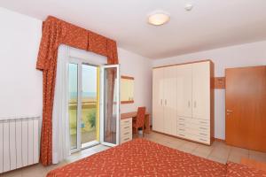Cama ou camas em um quarto em Hotel Villa Olga