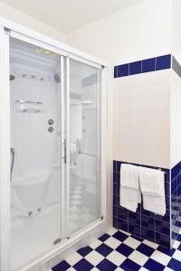 Um banheiro em Hotel Villa Olga