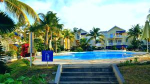 La alberca dentro o cerca de Villa in Le Tamier, 4 bedrooms, 300m Flic en Flac beach