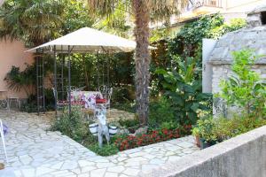 Сад в Apartment Ajdukovic