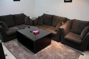 Un lugar para sentarse en Dorar Darea Serviced Apartments - Al Malqa