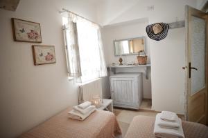Koupelna v ubytování Trulli di nonna Palma + 65 fotografií