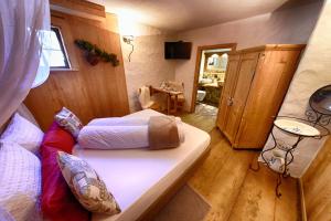 Agriturismo Baita De L'ALL客房内的一张或多张床位